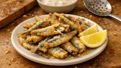 Γαύρος τηγανητός τραγανός και ελαφρύς: το σωστό αλεύρωμα και η θερμοκρασία του λαδιού